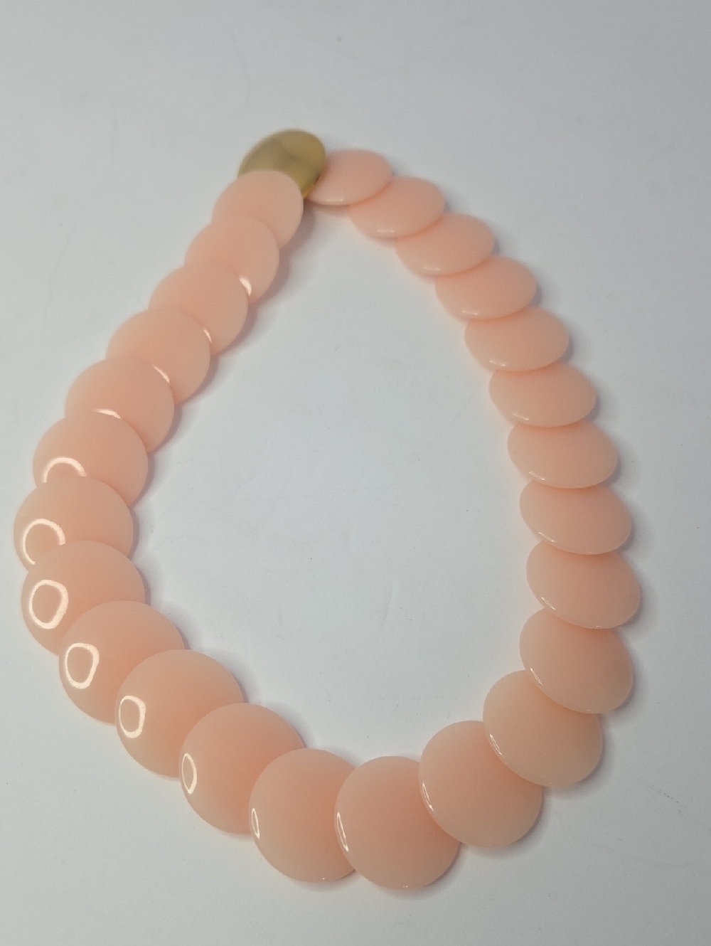 VIntage Trifari choker necklace featuring pink lucite discs & a gold-tone Clasp